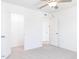 Bedroom view showcasing the entrance to a walk-in closet and an open door at 59 Davinhall Dr, Fuquay Varina, NC 27526