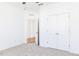Bedroom with plush carpet flooring and a double door closet at 59 Davinhall Dr, Fuquay Varina, NC 27526
