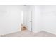 Bedroom showcasing the entrance to a walk-in closet with wood-style flooring at 59 Davinhall Dr, Fuquay Varina, NC 27526