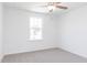 Bright bedroom with a ceiling fan and a window that provides natural light at 59 Davinhall Dr, Fuquay Varina, NC 27526