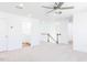 Upstairs landing offers bright space and access to bedrooms and bathrooms at 59 Davinhall Dr, Fuquay Varina, NC 27526