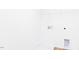 Bright laundry room with washer/dryer hookups and white shelving at 59 Davinhall Dr, Fuquay Varina, NC 27526