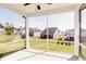 Screened porch overlooking a spacious backyard, perfect for enjoying the outdoors at 59 Davinhall Dr, Fuquay Varina, NC 27526