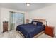 Cozy bedroom featuring plush carpet, natural light, and neutral wall paint at 728 Silo Park Dr, Wake Forest, NC 27587