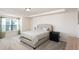 Cozy bedroom with large window, neutral color palette, and plush carpeting at 728 Silo Park Dr, Wake Forest, NC 27587
