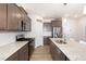 Modern kitchen with stainless steel appliances, granite countertops, and white subway tile at 728 Silo Park Dr, Wake Forest, NC 27587