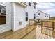 Rear view of home featuring a wooden deck at 89 Jumper St, Wendell, NC 27591