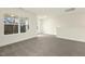 Upstairs carpeted bonus room with natural light at 89 Jumper St, Wendell, NC 27591