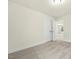 Bedroom featuring neutral walls, carpet and a view to the hallway and to another bedroom at 89 Jumper St, Wendell, NC 27591