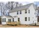 Two-story home exterior featuring a deck and ample natural light at 89 Jumper St, Wendell, NC 27591