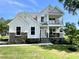 Beautiful two-story home with stone accents, covered porch, and balcony at 89 Jumper St, Wendell, NC 27591