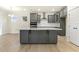 Kitchen with gray cabinets and a large kitchen island at 89 Jumper St, Wendell, NC 27591