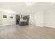 Spacious kitchen features gray cabinets, stainless steel appliances, and bright lighting at 89 Jumper St, Wendell, NC 27591