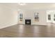 Bright living room with a fireplace at 89 Jumper St, Wendell, NC 27591