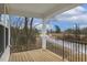 Relaxing covered porch with a wood floor and a view of the neighborhood and trees at 89 Jumper St, Wendell, NC 27591