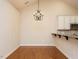 Dining room with hardwood floors and elegant chandelier at 992 Blue Bird Ln, Wake Forest, NC 27587