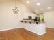 Dining room adjacent to kitchen with breakfast bar at 992 Blue Bird Ln, Wake Forest, NC 27587