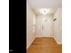 Bright and airy entryway with hardwood floors and coat rack at 992 Blue Bird Ln, Wake Forest, NC 27587