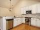 Kitchen with stainless steel appliances and granite countertops at 992 Blue Bird Ln, Wake Forest, NC 27587