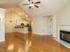 Spacious living room with hardwood floors, fireplace, and vaulted ceiling at 992 Blue Bird Ln, Wake Forest, NC 27587