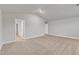 Large bedroom showcasing neutral carpet, high ceilings, and an open closet space at 107 Wilderness Ct, Mebane, NC 27302