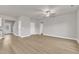 Expansive living space with luxury vinyl plank flooring, neutral paint, and a ceiling fan at 107 Wilderness Ct, Mebane, NC 27302