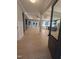 View from entry doorway into the kitchen and living room area at 129 Mayan Dr, Louisburg, NC 27549