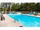 Open outdoor pool with ladder for easy access for a quick swim at 129 Mayan Dr, Louisburg, NC 27549