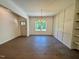 Dining room featuring hardwood floors, wainscoting, and natural light at 19 Covey Rise Way, Lillington, NC 27546