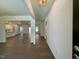 Bright and open foyer with hardwood floors and views of the kitchen at 19 Covey Rise Way, Lillington, NC 27546