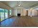 Bright living room with a fireplace and sliding glass doors to the deck at 19 Covey Rise Way, Lillington, NC 27546