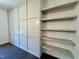 Close up of a wall with wainscoting and built-in shelves at 19 Covey Rise Way, Lillington, NC 27546