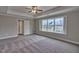 Bright bedroom featuring a window and ceiling fan at 222 Grand Griffon Way, Lillington, NC 27546