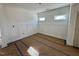 Bright dining room with wainscoting and hardwood floors at 222 Grand Griffon Way, Lillington, NC 27546