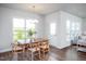 Charming dining area with wood table and chairs near sliding door at 271 Circle City Way, Pittsboro, NC 27312