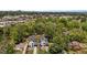 Stunning aerial view of two modern homes nestled amongst mature trees in a vibrant neighborhood at 339 1/2 Mulberry St, Raleigh, NC 27604