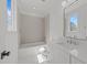 Cozy bathroom featuring a shower and tub combination and a vanity with sink at 339 1/2 Mulberry St, Raleigh, NC 27604