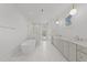 A spacious bathroom featuring a shower, tub, and double sink vanity at 339 1/2 Mulberry St, Raleigh, NC 27604