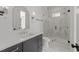 Modern bathroom featuring a vanity, glass shower, and elegant tile work at 339 1/2 Mulberry St, Raleigh, NC 27604