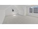 Bright bedroom with carpet, natural light, and a simple, clean aesthetic at 339 1/2 Mulberry St, Raleigh, NC 27604