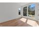 Bright bedroom with large windows and hardwood flooring at 339 1/2 Mulberry St, Raleigh, NC 27604