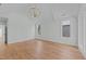 Bedroom featuring hardwood floors, recessed lighting and a chandelier at 339 1/2 Mulberry St, Raleigh, NC 27604