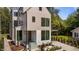 Modern two story home featuring clean lines, neutral siding, and elegant landscaping at 339 1/2 Mulberry St, Raleigh, NC 27604
