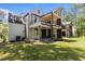 This home features a covered patio and balcony, perfect for enjoying the outdoors in comfort at 339 1/2 Mulberry St, Raleigh, NC 27604