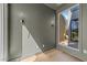 Stylish room showcasing modern lighting fixtures, hardwood floors, and large windows at 339 1/2 Mulberry St, Raleigh, NC 27604
