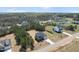 Overhead view showcasing a modern home surrounded by lush trees in a suburban neighborhood at 40 Misty Mountain, Spring Hope, NC 27882
