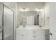 Bright bathroom featuring a double vanity, modern fixtures, and glass enclosed shower at 40 Misty Mountain, Spring Hope, NC 27882
