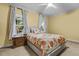 Cozy bedroom featuring natural light, carpeted floors, neutral walls and a comfortable bed at 5317 Burning Oak Ct, Raleigh, NC 27606
