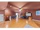 Spacious bonus room with a home theater setup and ample space for entertaining at 5317 Burning Oak Ct, Raleigh, NC 27606