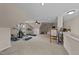Versatile bonus room with exercise equipment, neutral carpeting, and plenty of natural light at 5317 Burning Oak Ct, Raleigh, NC 27606